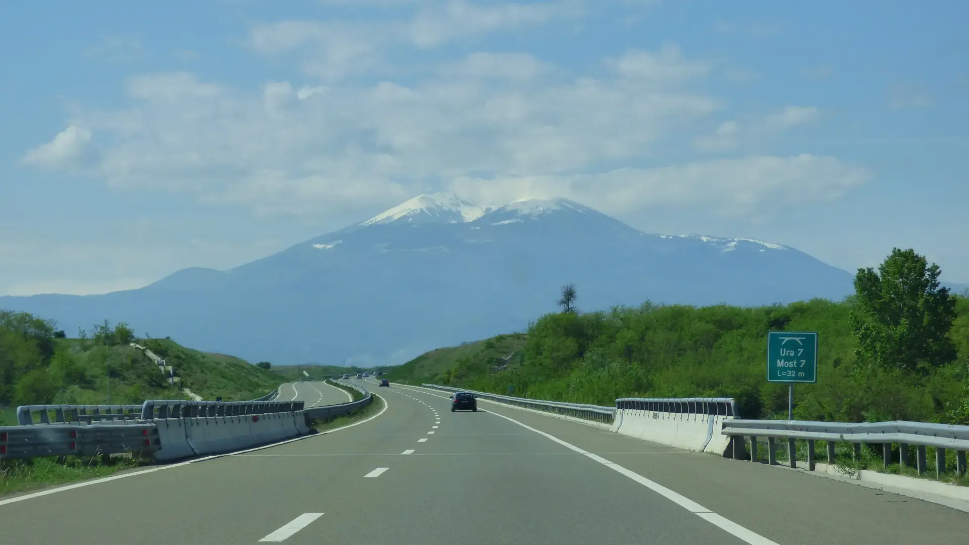 Kosovo's Route 7 motorway near Malisheva, the road link from Albania, with snow-capped mountains ahead